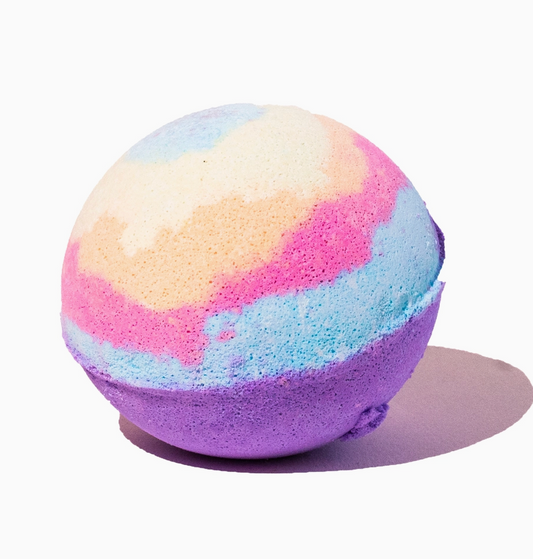 Colorful striped bath bomb on a white background