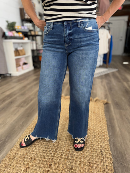 Mid Rise Medium Dark Wash Raw Hem Wide