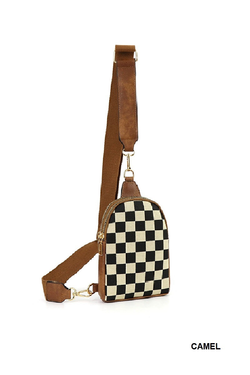 Checkered bag with brown strap on a white background