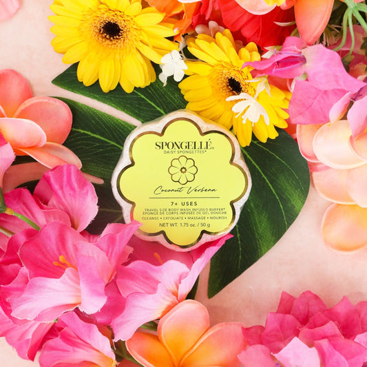 Spongelle body wash bar surrounded by colorful flowers