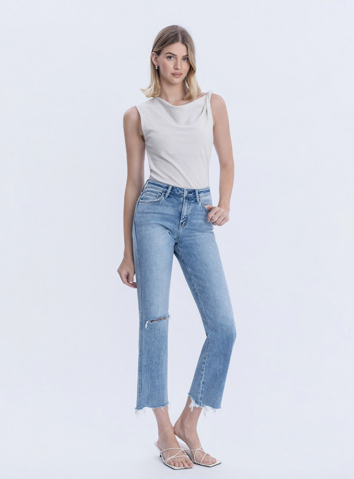High Rise Distressed Right Knee Straight Jeans