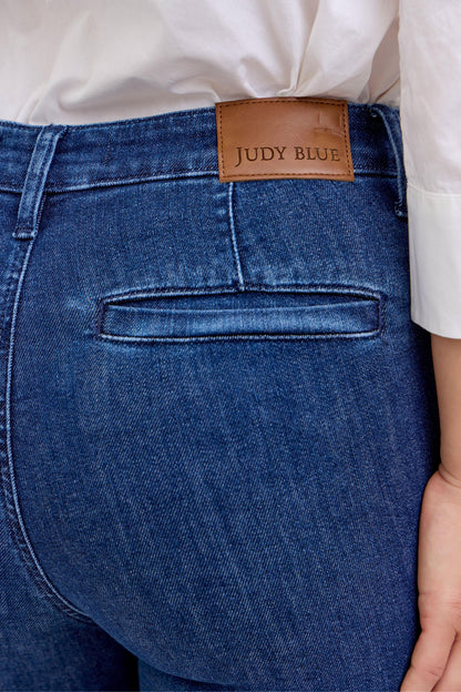 Blue jeans with a Judy Blue label on the back pocket.