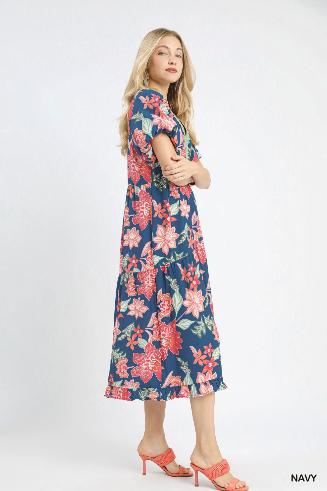Woman wearing a floral dress on a white background