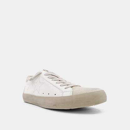 White sneaker on a light gray background