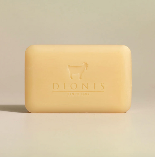 Beige bar of soap with 'Dionis' branding on a beige background