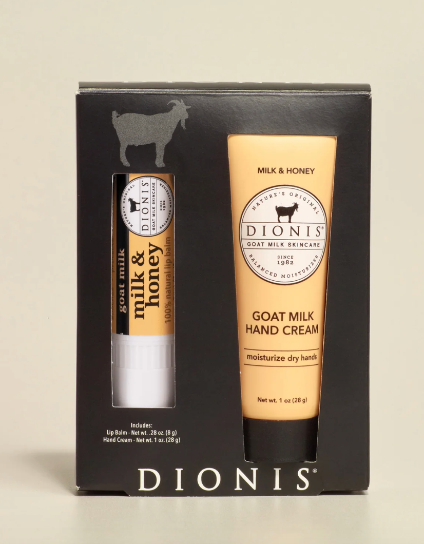 Dionis goat milk skincare set with hand cream and lip balm in a black box.