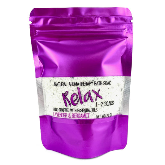 Purple packaging of natural aromatherapy bath soak with 'Relax' label on a white background