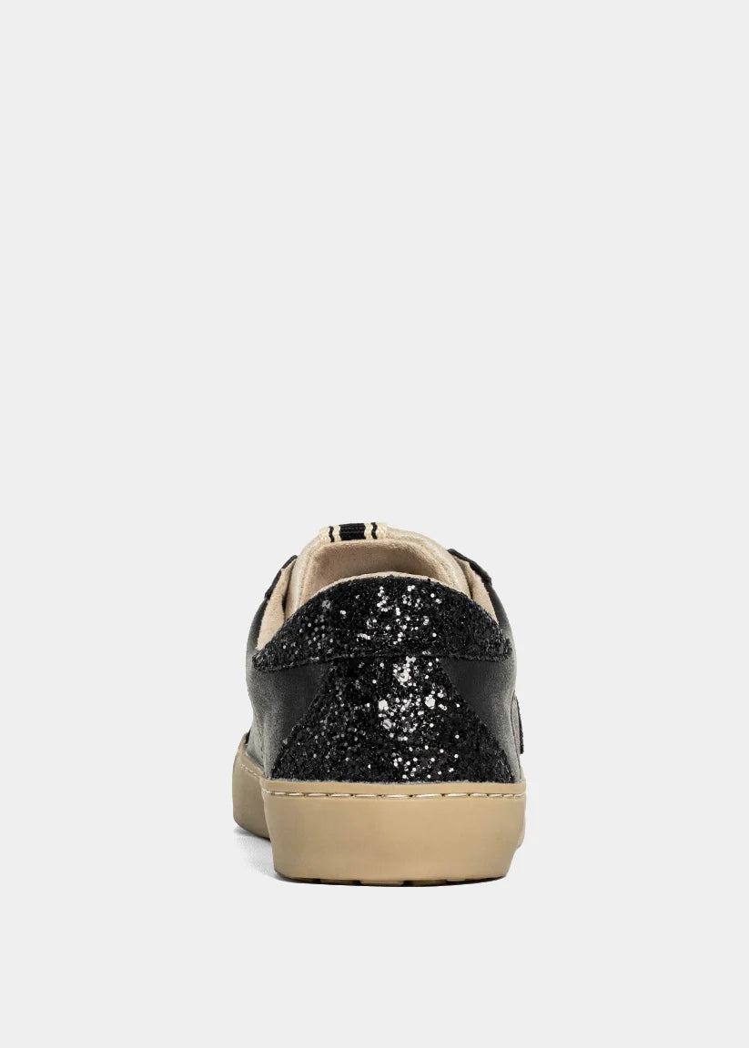 Black glitter sneaker with beige sole on a white background