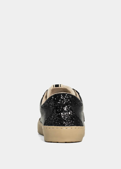 Black glitter sneaker with beige sole on a white background