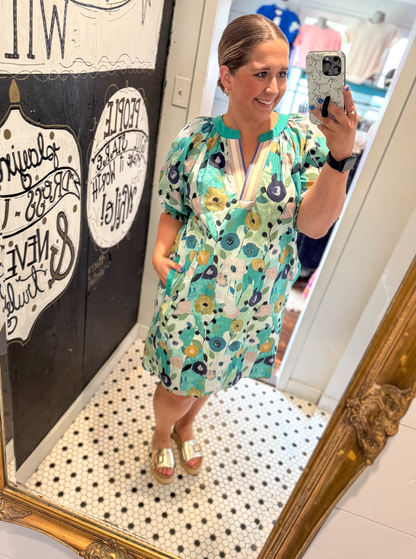 Women wearing a floral dress.