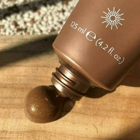 Brown bottle with a dropper on a wooden surface