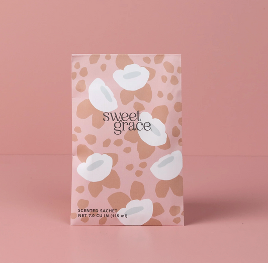 Scented sachet packaging with 'sweet grace' branding on a pink background