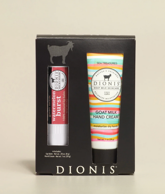 Dionis goat milk skincare set with cream and lip balm in a black box on a beige background