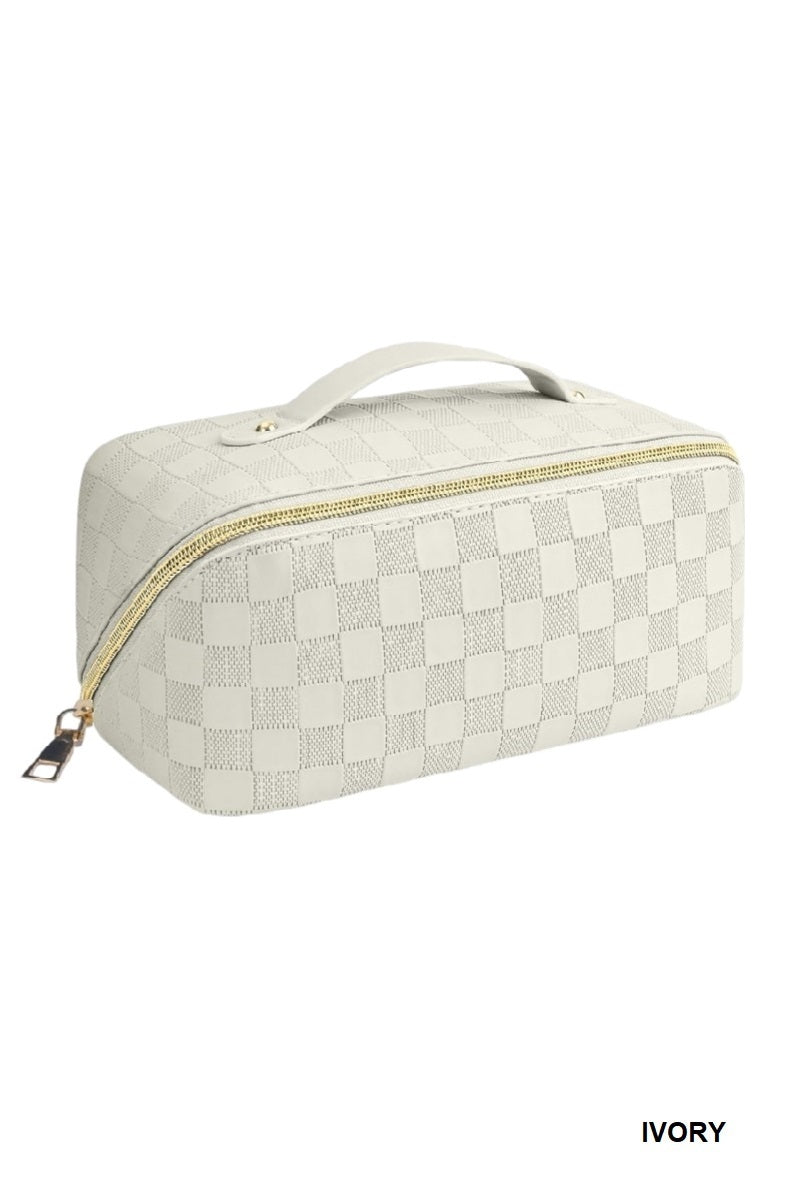 Checkered toiletry bag with gold zipper on a white background